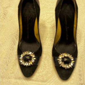 Giuseppe’s Zanetti Black Heels with Embellished silver buckle.